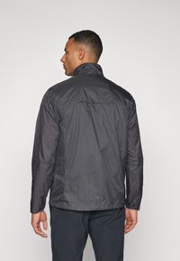 Patagonia HOUDINI STASH 1/2 ZIP  - Neperpučiamoji striukė - forge grey