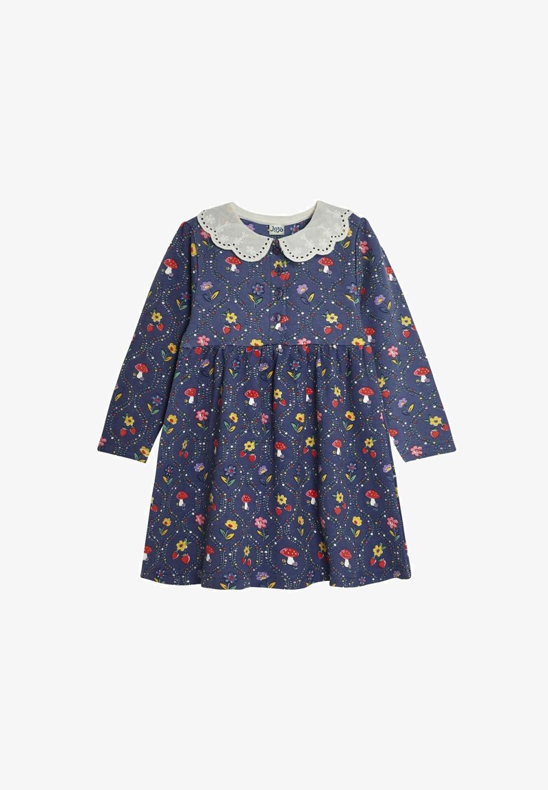 Námornícky šaty s dlhými rukávmi a bielym, zvlneným golierom. Obsahujú pestré kvietkové a hubové vzory. Sukňa s plisovaným dizajnom.