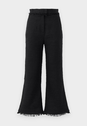 Black wide-leg pants with textured fabric, frayed hem, and elastic waistband. The design features a smooth finish and relaxed fit.