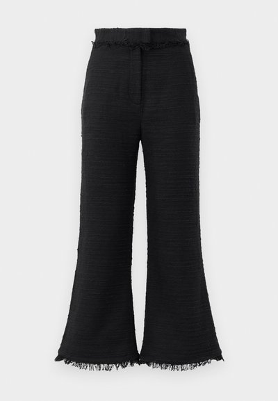 Black wide-leg pants with textured fabric, frayed hem, and elastic waistband. The design features a smooth finish and relaxed fit.