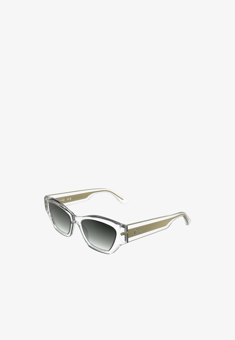 Lunettes de soleil transparentes avec verres à dégradé gris, monture angulaire, branches à accents dorés, présentant un motif texturé sur les côtés.