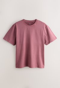 T-shirt uni à manches courtes avec col rond de couleur vieux rose, taille moyenne, présenté à plat sur un fond clair.
