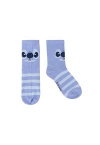 Calzini di un leggero colore viola con un design a faccia di personaggio dei cartoni animati, caratterizzati da grandi occhi e un naso, completati da righe orizzontali di un blu chiaro.