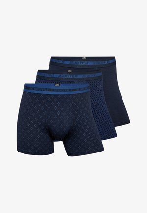 Tres pares de calzoncillos boxer de color azul oscuro con diferentes patrones: uno liso, uno a cuadros y uno de diseño en rombos. Cinturas elásticas con logo.