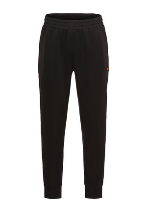 Pantalones de chándal negros con cinturilla elástica, piernas ajustadas, bolsillos laterales y un pequeño logo en naranja en la cadera. Textura de tela suave.