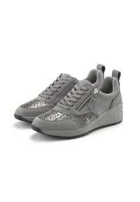 Gray sneakers with a suede upper, featuring a textured metallic accent on the toe, flat laces, and a side zipper detail.
