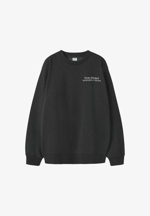 Black sweatshirt featuring a round neckline, long sleeves, and white text detail on the chest with coordinates and "Porte d'Auteuil."