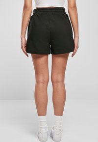 Karl Kani Shorts - black
