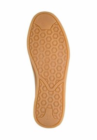 Semelle de chaussure en caoutchouc beige avec un motif hexagonal. Finition lisse avec une légère texture au niveau des orteils et du talon. Taille 37 indiquée.