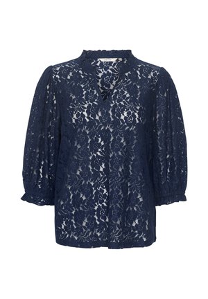 Blouse en dentelle bleu marine avec un motif floral, dotée d'un col froncé et de manches bouffantes, conçue pour un ajustement ample et confortable.