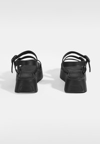 Desa Keilsandalette - black