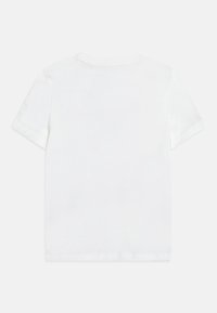 Plain white short-sleeve crew neck t-shirt shown from the back on a light gray background.
