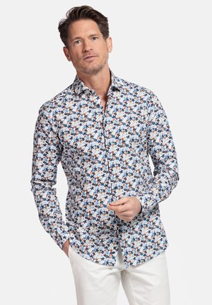 Witte overhemd met een kleurrijk bloemenpatroon in blauw, oranje en groen; heeft een getailleerd ontwerp en lange mouwen.