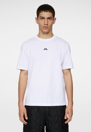 White cotton t-shirt featuring a black logo design at the center. Short sleeves and a crew neck style. Smooth texture.