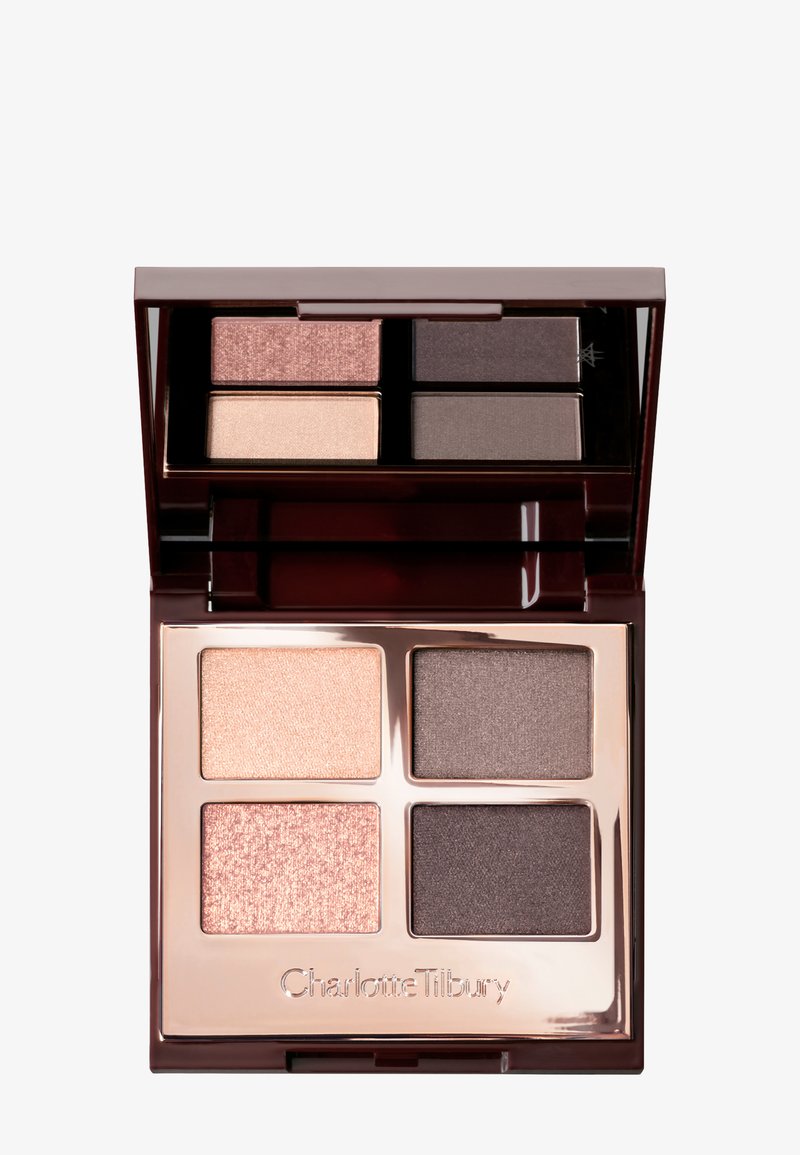 Compact eyeshadow palette with four shades: light beige, pink shimmer, taupe, and dark brown, with a built-in mirror.