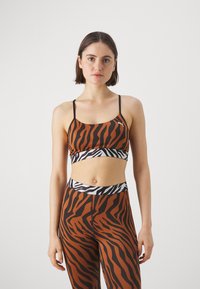 Puma MOVE ANIMAL REMIX BRA - Športni modrček z rahlo podporo - teak