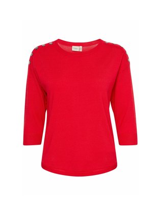 Punane kudum ülemine osa kolmeveerandi varrukatega, ümmarguse kaelusega ja nööbivajutusega detailidega õlgadel. Pehme tekstuur ja liibuv disain.