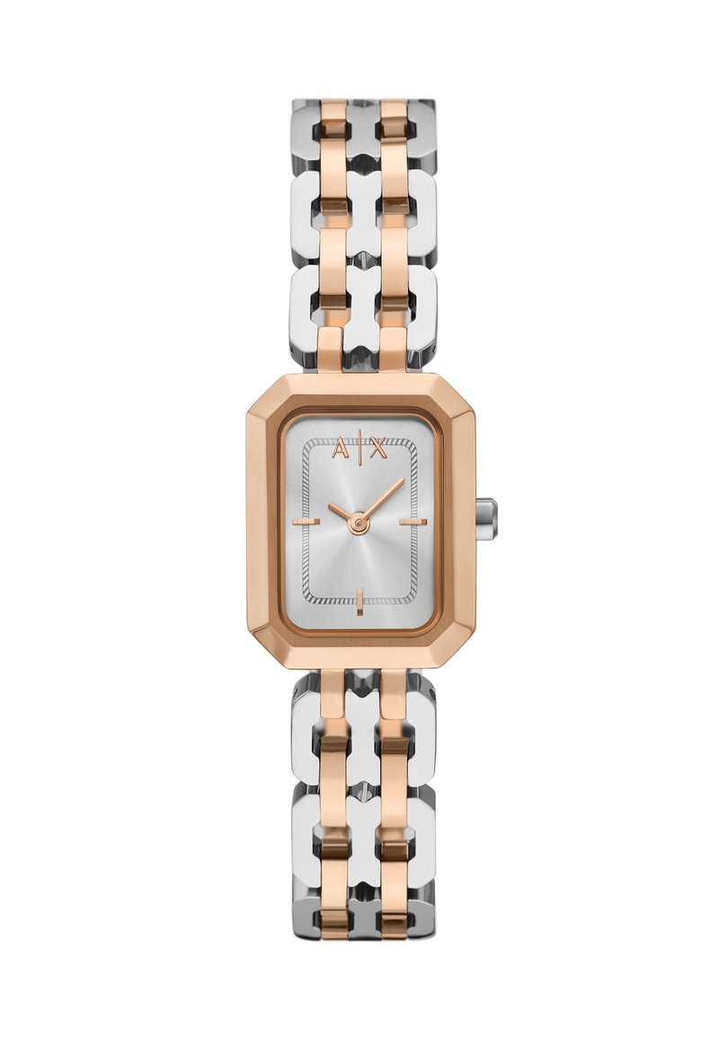 Obdélníkový stříbrný hodink s růžovými zlatými akcenty, s kovovým páskem a minimalistickým ciferníkem s hodinovými značkami a ručičkami.