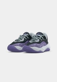 Athletic shoes featuring a black mesh upper with purple camo accents, white midsole, and rubber outsole with purple details. Light gray laces.