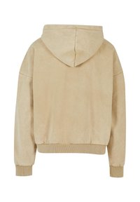 Felpa con cappuccio beige, dalla superficie morbida e texturizzata, con polsini elastici e orlo corto, che mostra un design semplice e minimalista.