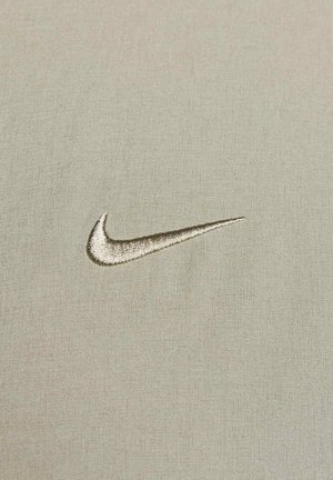 Nike Performance UNLIMITED - Soft shell jacket - light army black light army
