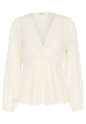 Bílá blůza s dlouhými rukávy a hlubokým výstřihem do V, staženým pasem a plisovaným předním dílem. Měkká, splývavá látka s hladkým povrchem.