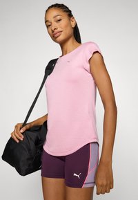 Puma TEE - Sport T-Shirt - poised pink heather