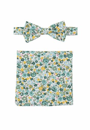 Floraler Fliegen und Einstecktuch Set. Hellblaue Hintergrund mit grünen, gelben und pinken Blumen. Weiches Baumwollgewebe, sauber genähte Kanten.