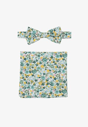 Floraler Fliegen und Einstecktuch Set. Hellblaue Hintergrund mit grünen, gelben und pinken Blumen. Weiches Baumwollgewebe, sauber genähte Kanten.