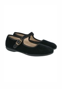Zapatos Mary Jane de terciopelo negro con puntera redonda, suela plana y correa ajustable con hebilla de latón. Forro interior suave.