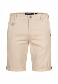 Beżowe bawełniane szorty z zapięciem na guzik, czterema kieszeniami i podwiniętym dołem. Wyróżnia się skórzaną łatą z logo z tyłu.