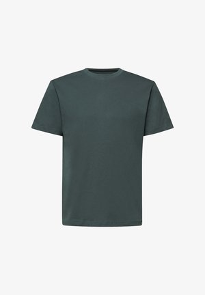 T-shirt vert foncé à manches courtes et col rond, au design simple et uni, sans logos ni motifs visibles.