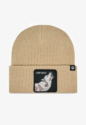Berretto beige a maglia con risvolto, dotato di una patch nera che raffigura un lupo ululante e la scritta "LONE WOLF" in bianco.