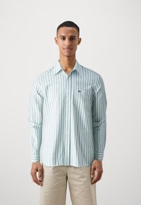 Lacoste Marškiniai - fluorine green/white