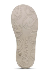 Sole di scarpa in gomma di un beige chiaro con motivi testurizzati, caratterizzata da design circolari e il nome del marchio "Naturino" impresso vicino al tallone.