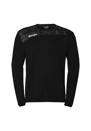 Schwarzes Sportshirt mit langen Ärmeln, geometrisch gemustertem Passe und weißem "Kempa"-Logo auf der linken Brust.