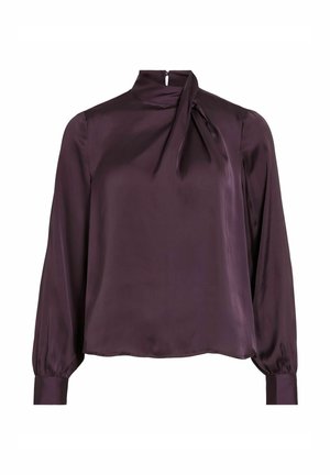 Satin blouse in dieppaars met een hoge halslijn en een strikdetail. Heeft lange, luchtige mouwen en manchetafwerkingen. Vlekkeloze textuur.