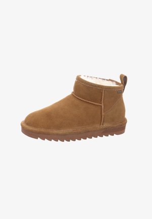 Braune Wildleder-Stiefeletten mit einem weichen Fellfutter, runder Zehenpartie und einer strukturierten Gummisohle. Mit einem Zugschlaufen für einfaches Anziehen.