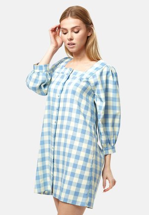 Blue and yellow checked dress with a square neckline, long puff sleeves, and buttons down the front, made from a soft fabric.