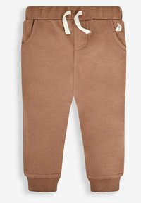 Ruske puuvillased jogger-püksid elastse vöökoha, nööride ja küljetaskutega. Omab ribatud mansette ja väikest purjepaat logo puusa kohal.