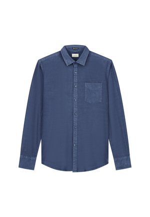 Tamsiai mėlyna ilgarankovė marškinėlių su struktūruotu audiniu, mygtukų užsegimo apykakle, priekinė kišenė ir mygtukų uždarymu, pasižyminti laisvu siluetu.