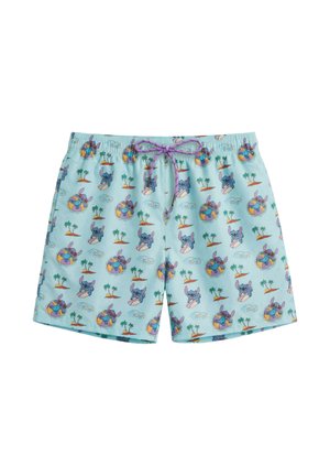 Bañador corto azul claro con cordón morado, cubierto con dibujos animados de un personaje alienígena surfeando, flotando en un anillo y con patrones de isla con palmeras.