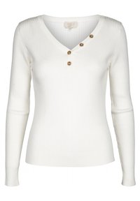 Vit ribbad långärmad topp med V-ringning och tre dekorativa guldknappar nära kragen. Mjukt tyg med fitted silhuett.