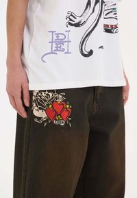 Ed Hardy DEATH BEFORE DISHONOR XTRA  - Flared jeans - black