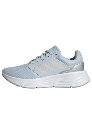 Light blue athletic sneakers with a textured mesh upper, white cushioned outsole, and cream-colored stripes on the sides.