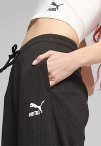 Puma RELAXED - Träningsbyxor - black