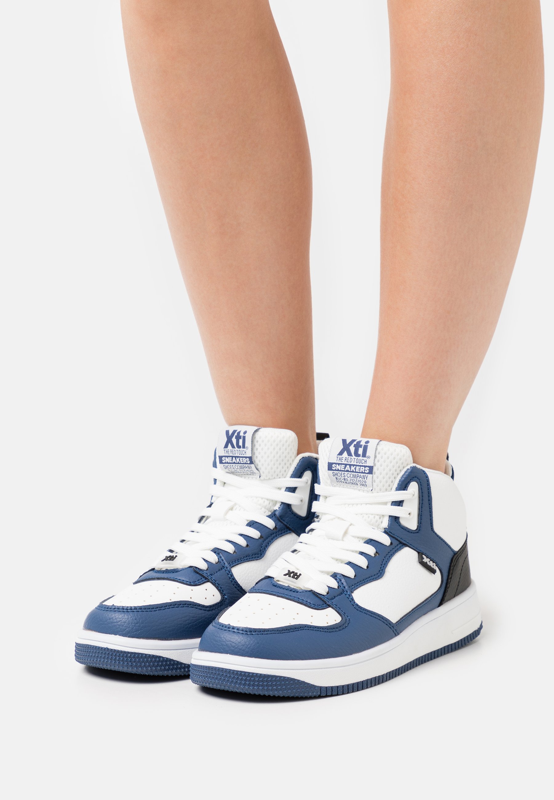 xti blue trainers