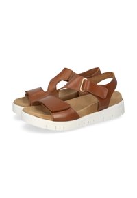 Brown leather sandals featuring an open toe design, adjustable strap with buckle, and a white, textured rubber sole.