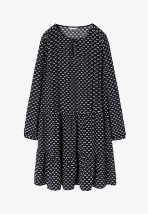 Tumes kleit pikkade varrukatega, ümmarguse kaelusega ja kihilistest kihtidest koosneva kujundusega. Omaduseks on heledates toonides lillemuster ja kaeluse juures olev võtmeaugu nööp.