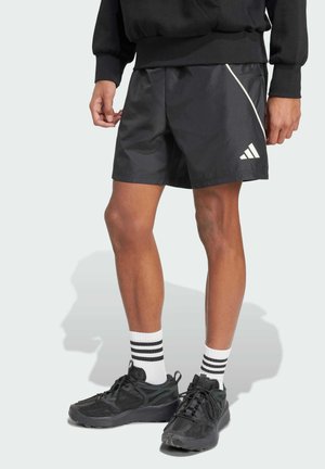 STADIUM - Tracksuit bottoms - black off white